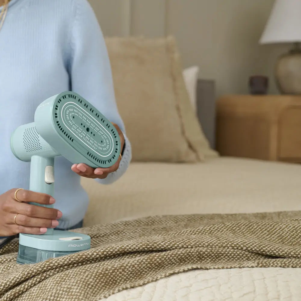Twist Handheld Steamer with Opti-Flow Suction