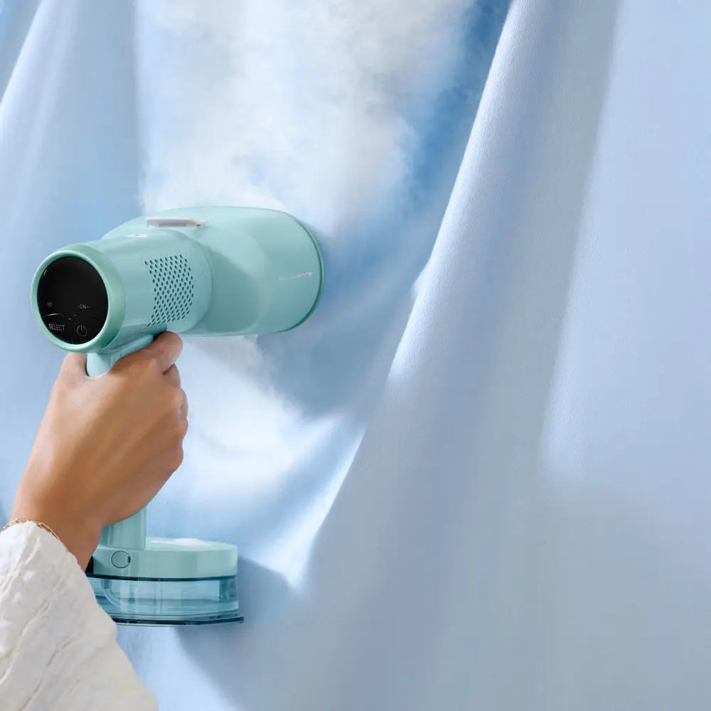Twist Handheld Steamer with Opti-Flow Suction